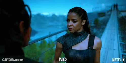 A Netflix Ad Shows A Woman Standing Next To Another Woman GIF