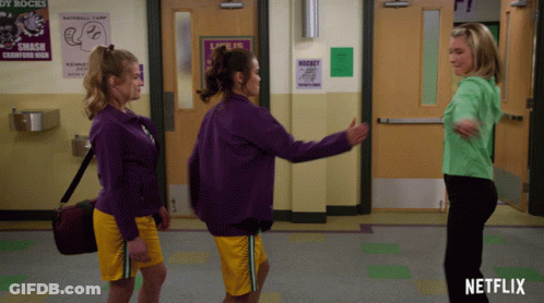 Three Women In Purple Sweatshirts Netflix Ad GIF