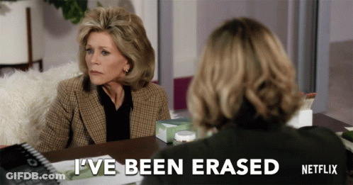 A Netflix Ad Shows Two Women Sitting At A Desk GIF