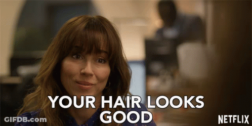 A Netflix Ad With A Woman And The Words Your Hair Looks Good GIF