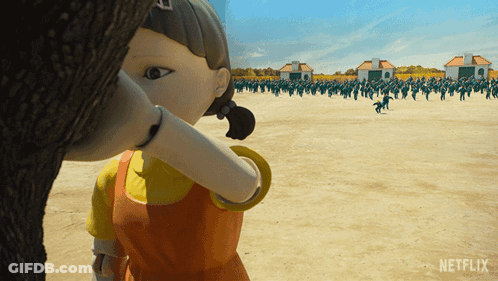 A Netflix Advertisement Shows A Doll Standing In A Field GIF