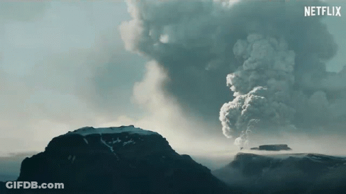 A Netflix Advertisement Shows A Volcano Erupting With Smoke Coming Out Of It GIF