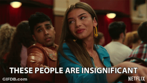 A Netflix Advertisement Shows A Woman And A Man And Says These People Are Insignificant GIF