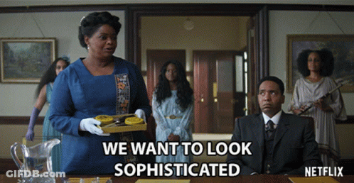 A Netflix Advertisement Shows A Woman Holding A Tray Of Cookies GIF