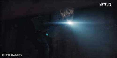 A Netflix Logo Is Displayed In The Dark GIF