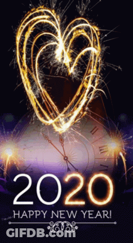 A New Year Greeting Card With A Heart Made Of Sparklers GIF