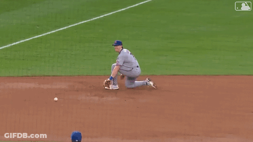 A New York Mets Pitcher Is Throwing A Baseball GIF
