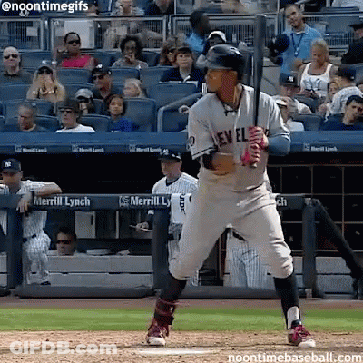 A New York Yankees Baseball Player Getting Ready To Swing At A Pitch GIF