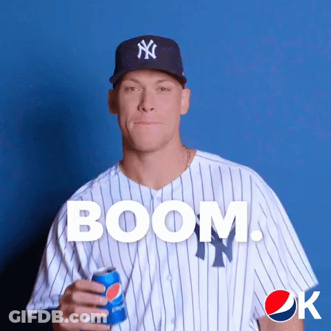 A New York Yankees Baseball Player Holding A Pepsi Can GIF