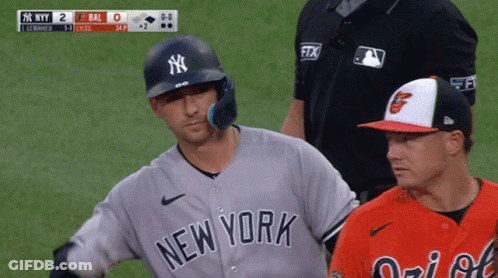 A New York Yankees Baseball Player Talks To Another Player GIF
