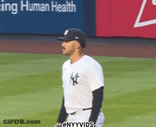 A New York Yankees Player Stands On The Field GIF