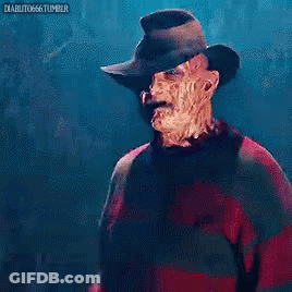 A Nightmare Before Christmas Freddy Krueger Is Wearing A Red Sweater And A Hat GIF