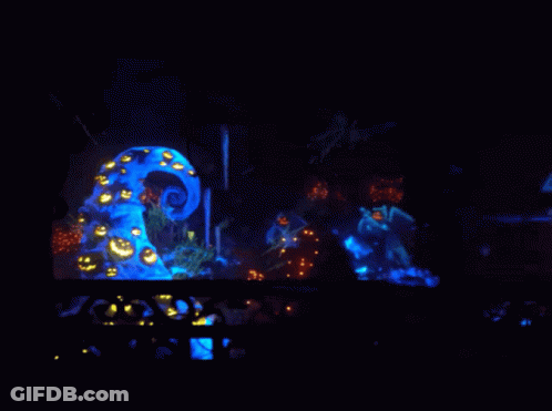 A Nightmare Before Christmas Scene With Pumpkins And A Tree GIF