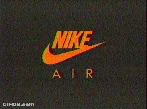 A Nike Air Logo On A Dark Background GIF