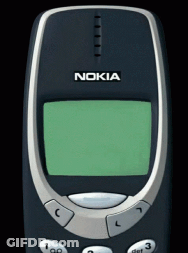 A Nokia Phone With A Green Screen And Buttons GIF