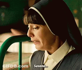 A Nun Is Sitting In A Hospital Bed With A Green Railing And Crying . GIF
