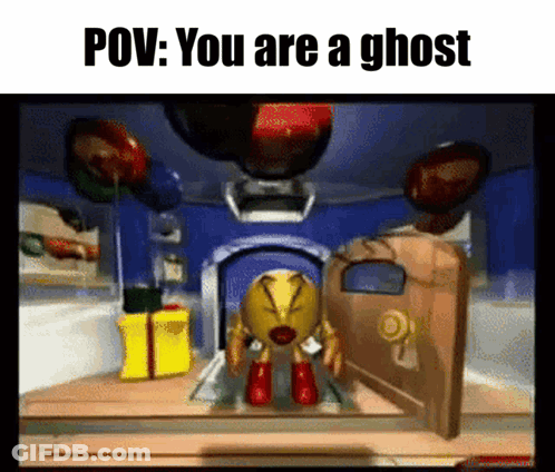 A Pac Man Video Game Scene With The Caption " You Are A Ghost " . GIF
