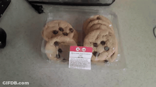 A Package Of Chocolate Chip Cookies Sitting On A Countertop GIF