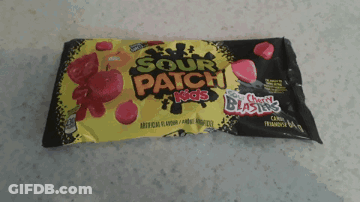 A Package Of Sour Patch Kids Candy Sitting On A Counter GIF