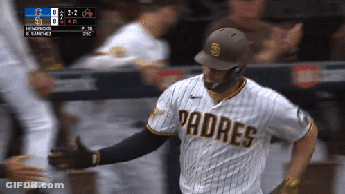 A Padres Baseball Player Giving A High Five GIF