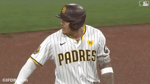 A Padres Baseball Player Wearing A Helmet And Jersey GIF