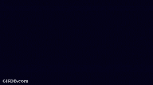 Blue And Red Smoke Coming From Person's Mouth GIF