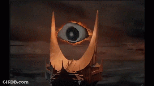 A Painting Of A Castle With A Large Eye In The Middle GIF