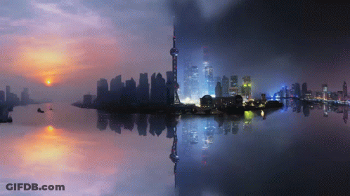 A Painting Of A City Skyline At Sunset And At Night GIF