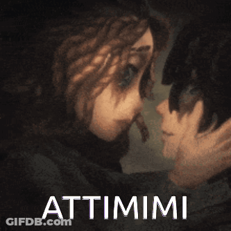 Kissing Man And Woman With Attimii Text GIF