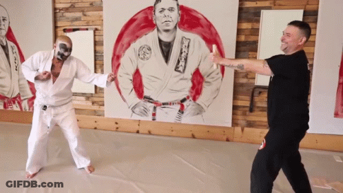 A Painting Of A Man In A Karate Uniform With A Belt That Says ' Karate ' On It GIF