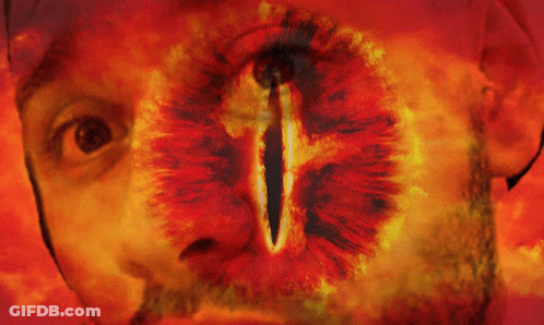 A Painting Of A Man 'S Face With A Cross On It GIF