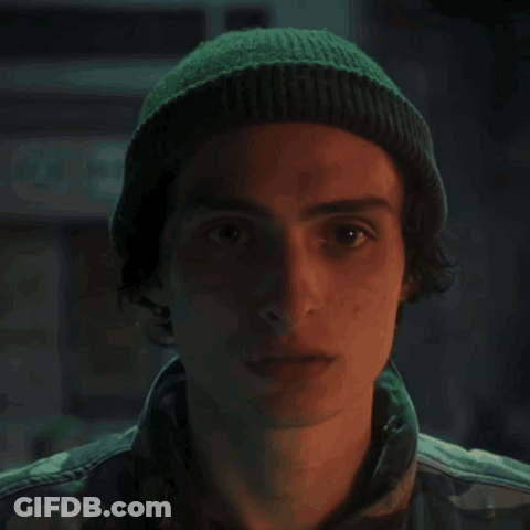 A Painting Of A Man Wearing A Helmet With The Letter M On The Front GIF