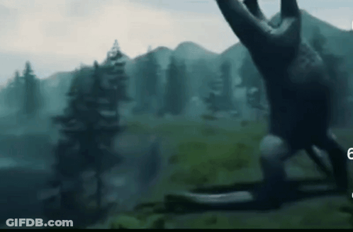 A Painting Of A Monster In A Forest With Mountains In The Background . GIF