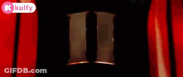 A Painting Of A Person Standing In A Dark Room Surrounded By Red And White Lights . GIF
