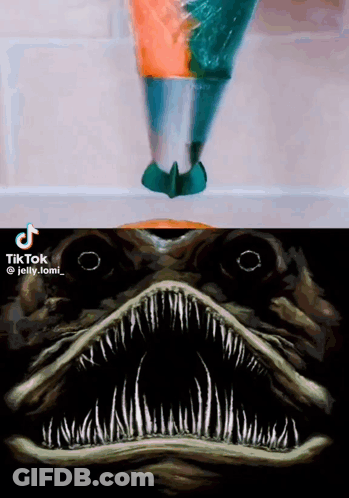 A Painting Of A Shark 'S Mouth Next To A Painting Of A Person 'S Head GIF