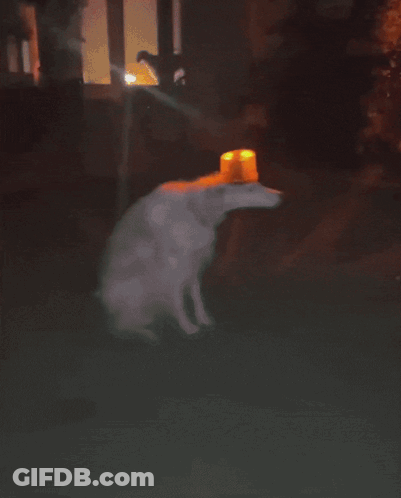 A Painting Of A Sheep With Its Mouth Open And A Red Light On Its Head GIF