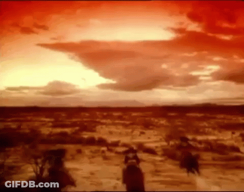 A Painting Of A Sunset In The Desert With A Red Sky GIF