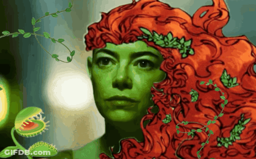 A Painting Of A Woman With Green Hair And A Carnivorous Plant Behind Her GIF
