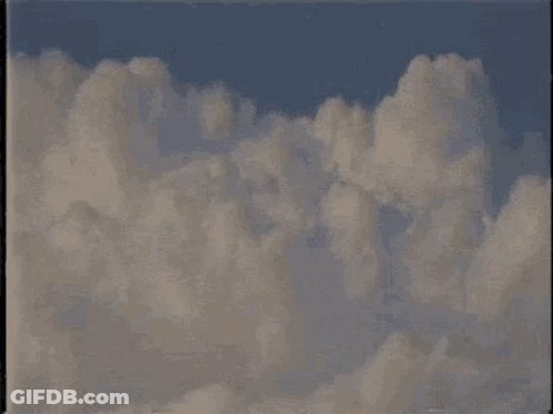 A Painting Of Clouds In A Blue Sky With A Black Frame GIF