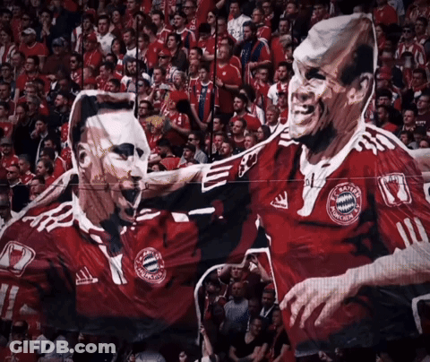 A Painting Of Two Soccer Players With Bayern Munich Written On Their Shirts GIF