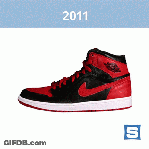 A Pair Of Black And Red Air Jordan Shoes From 2011 GIF