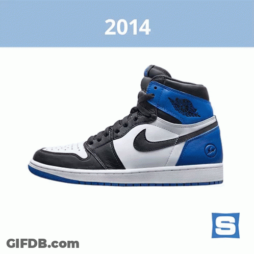 A Pair Of Black And White Nike Shoes With The Year 2014 On The Bottom GIF