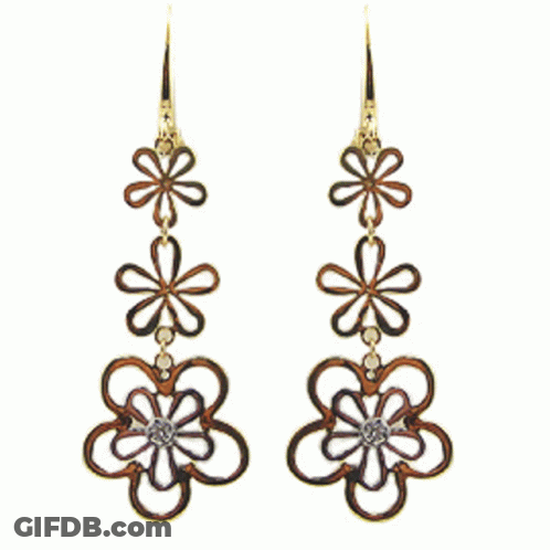 A Pair Of Earrings With A Pear Shaped Diamond GIF