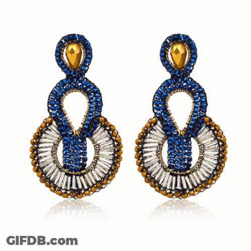 A Pair Of Earrings With Blue And White Beads GIF