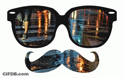 A Pair Of Glasses And A Mustache With A Reflection Of A City GIF