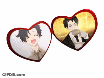 A Pair Of Heart Shaped Sunglasses With A Picture Of A Man On Them GIF
