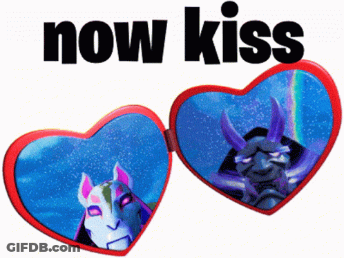 A Pair Of Heart Shaped Sunglasses With The Words Now Kiss GIF
