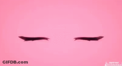 A Pair Of Pink Anime Eyes With A Smiley Face On A Pink Background . GIF