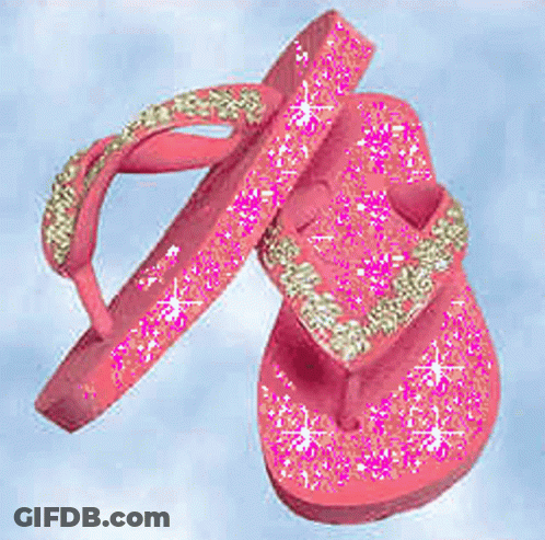 A Pair Of Pink Flip Flops With Glitter And Rhinestones On Them . GIF