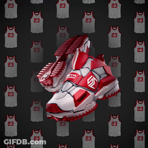 A Pair Of Red And White Basketball Shoes With The Number 23 On The Side GIF